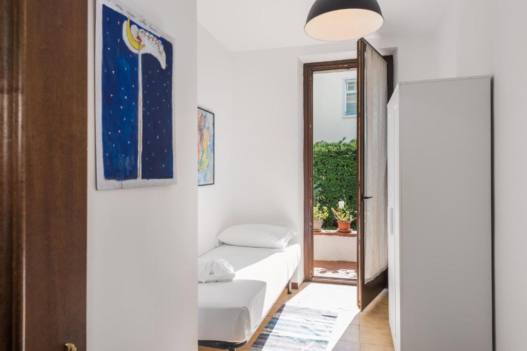 Posteľ alebo postele v izbe v ubytovaní Flats4rent Sabotino