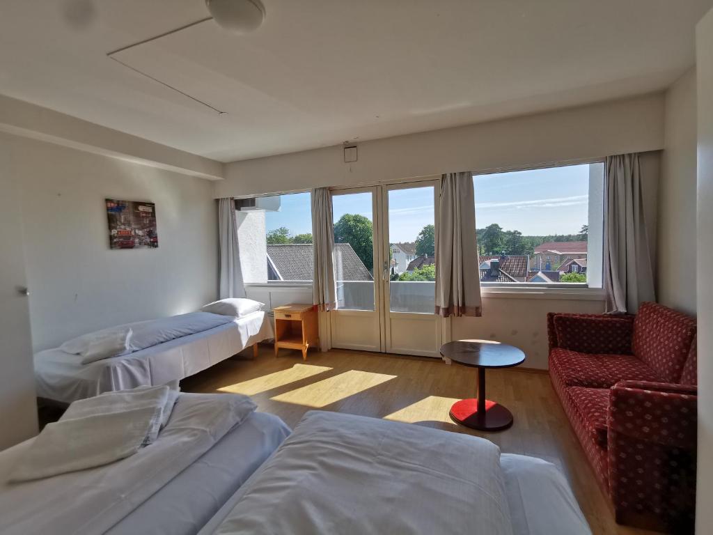 En eller flere senger på et rom på SKAP Hostel Mandal