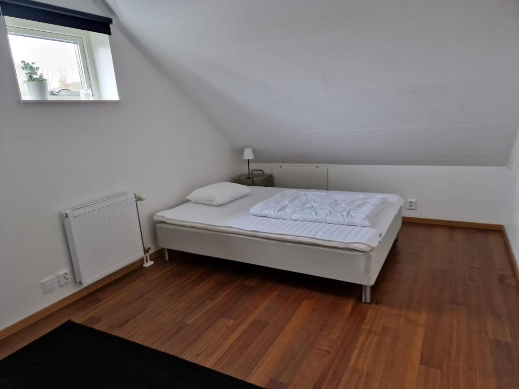 Postel nebo postele na pokoji v ubytování Mellby Kite Surf Villa