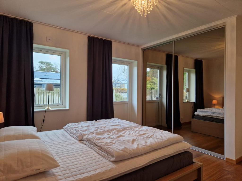 Postel nebo postele na pokoji v ubytování Mellby Kite Surf Villa