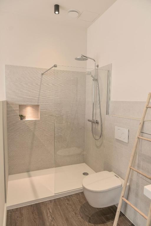 Koupelna v ubytování Hof van In & Wellness