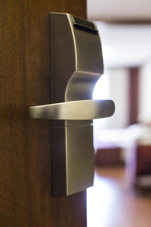 Postel nebo postele na pokoji v ubytování Hotel Crystal