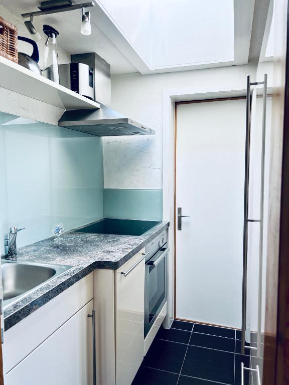 Kuchyň nebo kuchyňský kout v ubytování Chalet Gauschla - CharmingStay