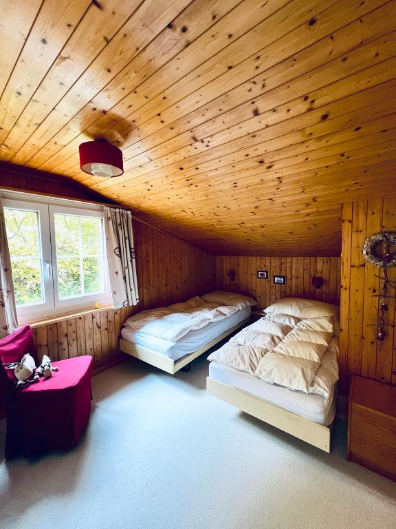 Postel nebo postele na pokoji v ubytování Chalet Gauschla - CharmingStay
