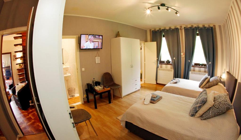Postel nebo postele na pokoji v ubytování B&B Au Coq en Pate