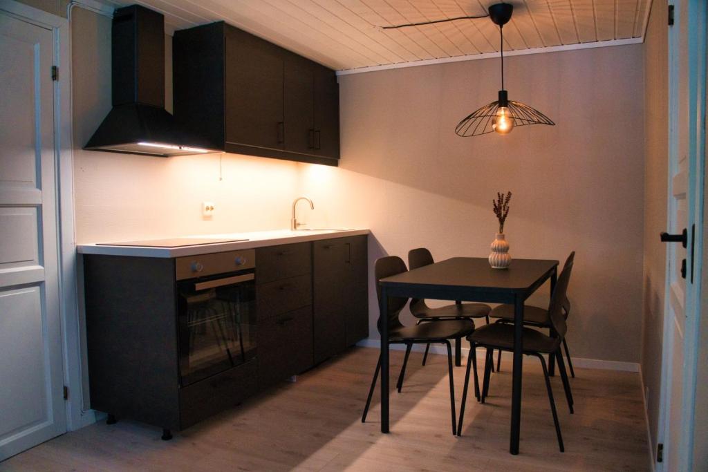 Een keuken of kitchenette bij Sølvgarden Cottages