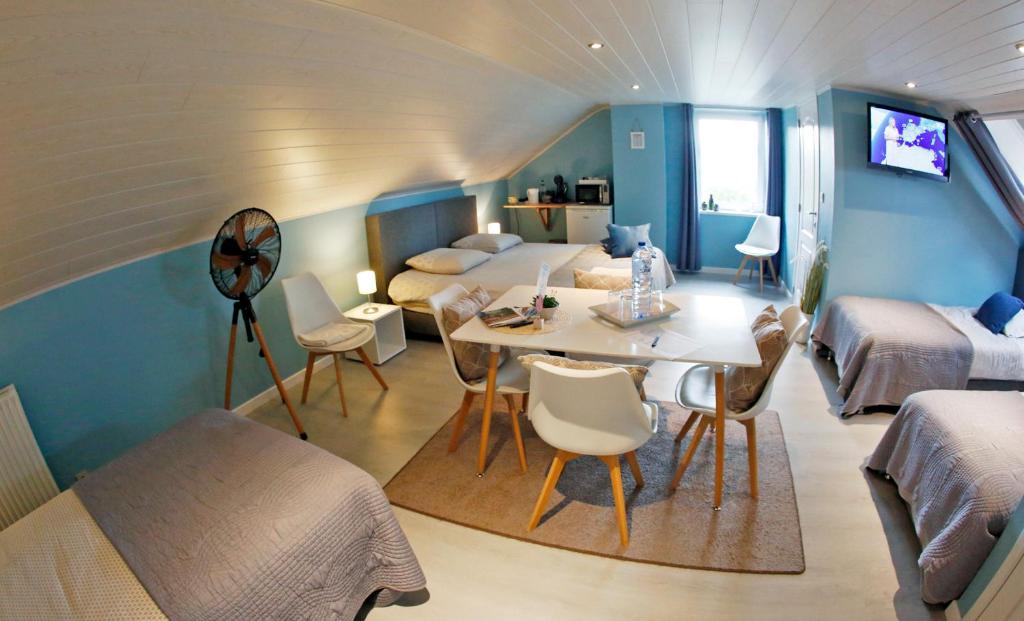 Posezení v ubytování B&B Au Coq en Pate