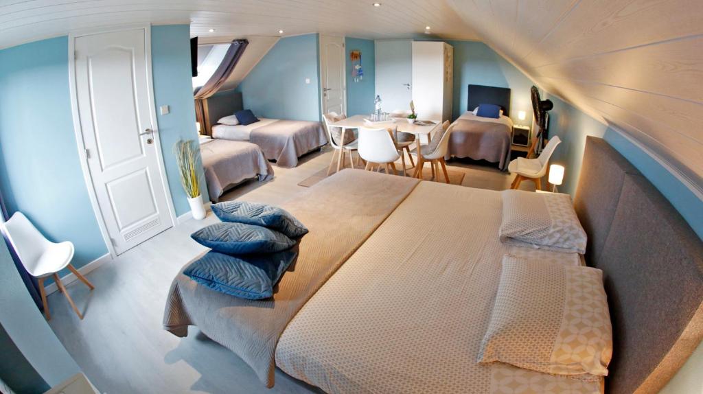 Postel nebo postele na pokoji v ubytování B&B Au Coq en Pate