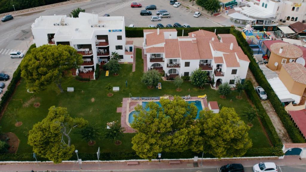an aerial view of a house with a yard at SOL Y MAR in Cala en Blanes