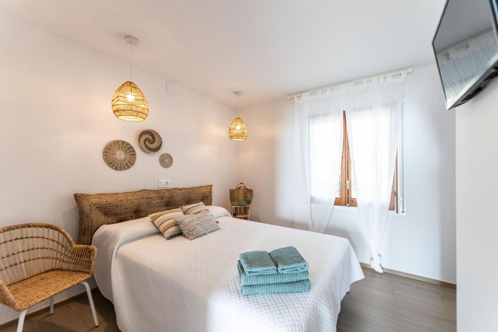 Postel nebo postele na pokoji v ubytování Blau d'Aro - Encanto y Relax en Platja d'Aro - Vistas al Mar y Parking privado