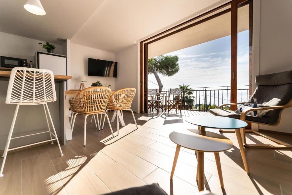 TV a/nebo společenská místnost v ubytování Blau d'Aro - Encanto y Relax en Platja d'Aro - Vistas al Mar y Parking privado