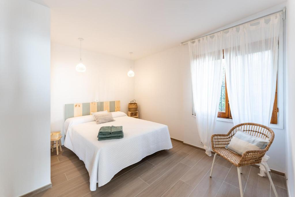 Postel nebo postele na pokoji v ubytování Blau d'Aro - Encanto y Relax en Platja d'Aro - Vistas al Mar y Parking privado