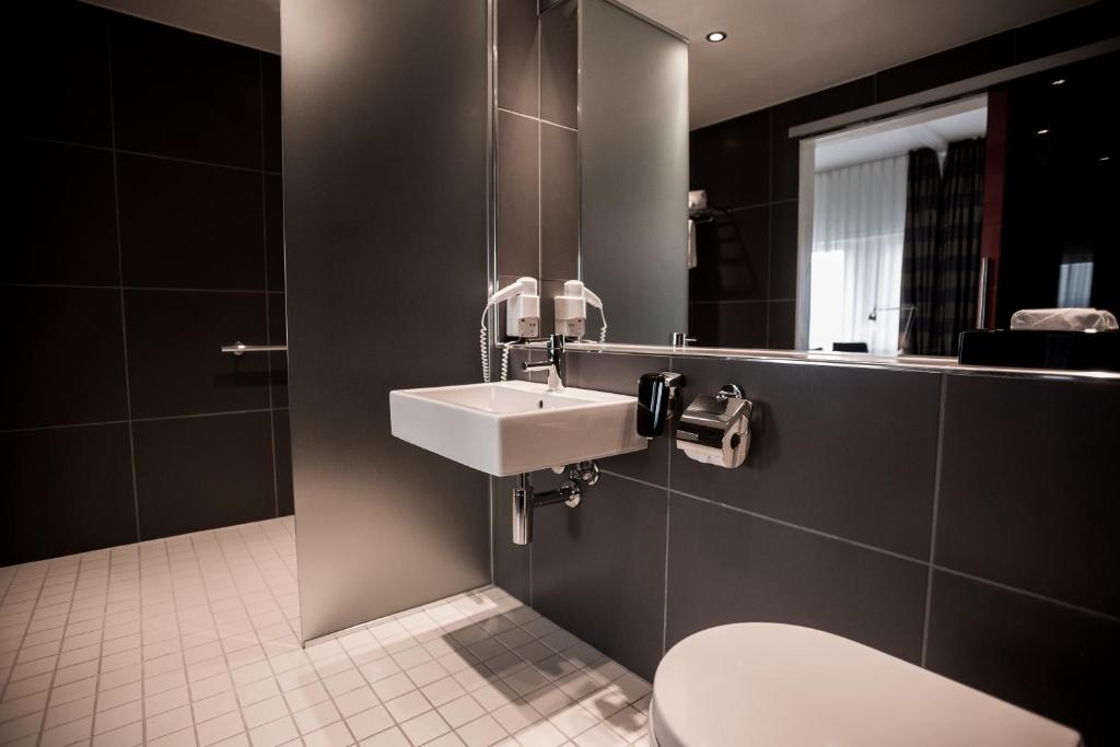 Koupelna v ubytování Quality Hotel Edvard Grieg
