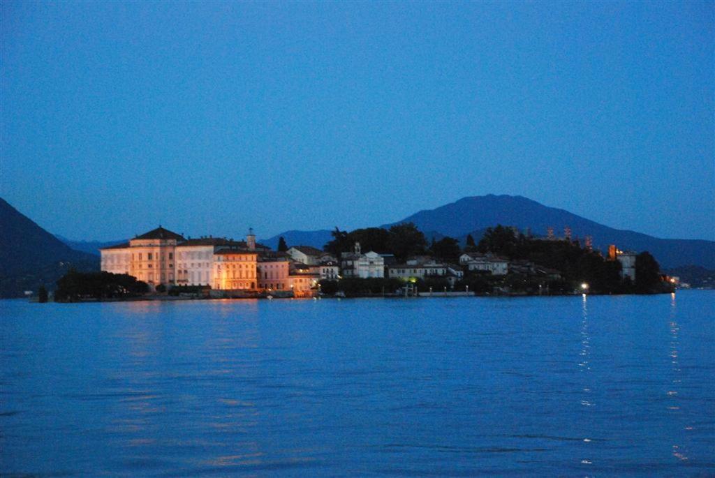 a city on the shore of a large body of water at Hotel Villa Ruscello in Baveno