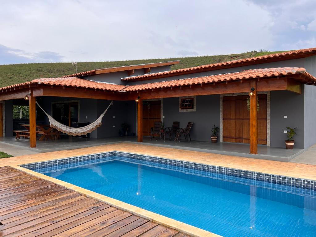 Swimmingpoolen hos eller tæt på Sítio Santo Antônio