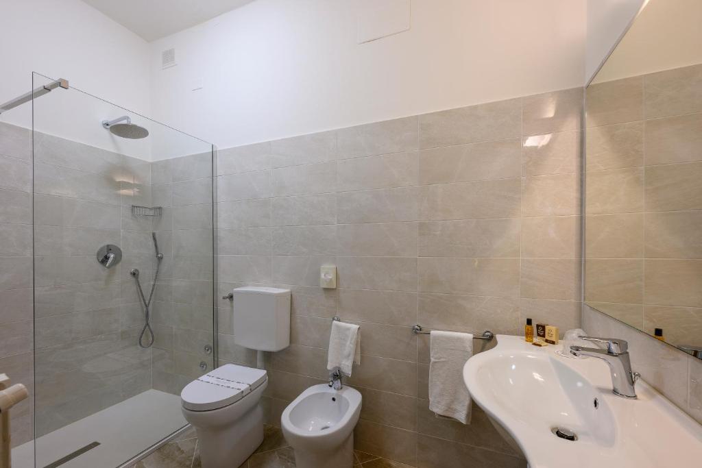 Koupelna v ubytování Albergo Reggio