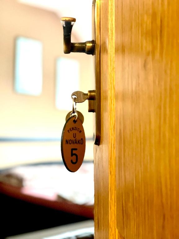 Postel nebo postele na pokoji v ubytování Penzion a restaurace U Nováků