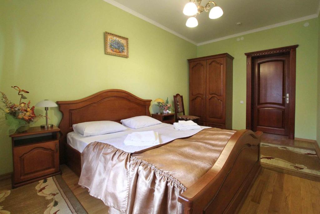 Postel nebo postele na pokoji v ubytování VillaPark