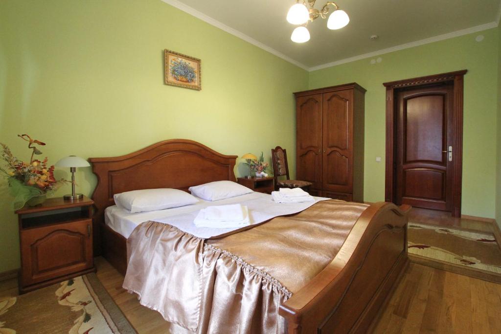 Postel nebo postele na pokoji v ubytování VillaPark