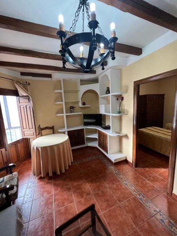 A bed or beds in a room at Apartamentos Turísticos La Posada