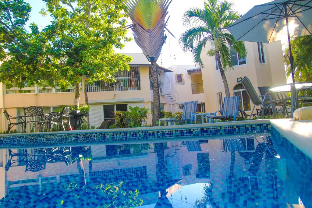 Bazén v ubytování Apartamento BOUTIQUE con encanto en Juan Dolio-Metro Country Club-CON PISCINA, SEGURIDAD PRIVADA, ENERGIA 24-7, CAMPO DE GOLF Y TENIS nebo v jeho okolí