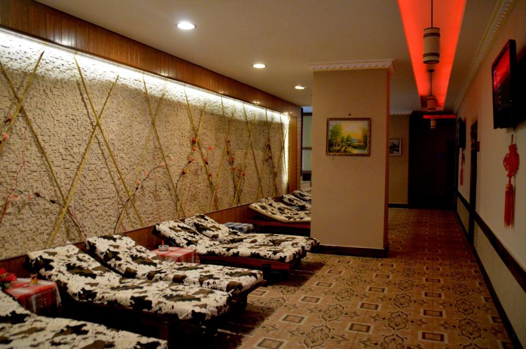 TV a/nebo společenská místnost v ubytování Magic Sun Hotel