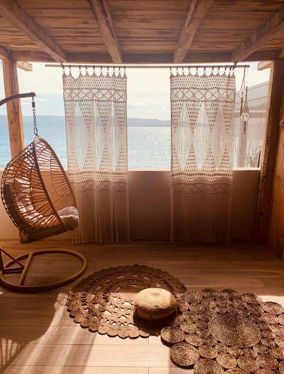 a room with a view of the ocean at Palm Beach in Ajaccio