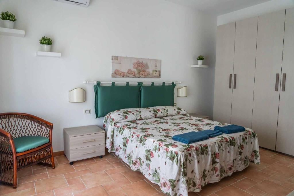 Tempat tidur dalam kamar di Residenza Lucia