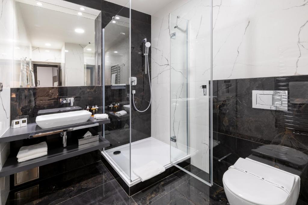 Koupelna v ubytování Hotel Ikona
