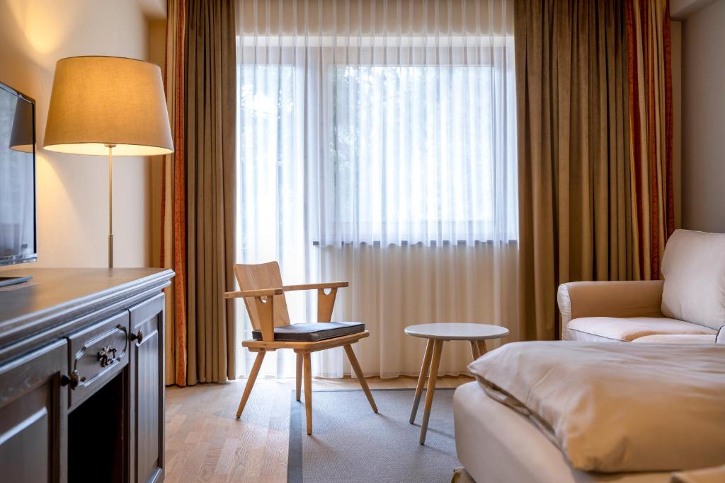 Postel nebo postele na pokoji v ubytování Hotel Edelweiss