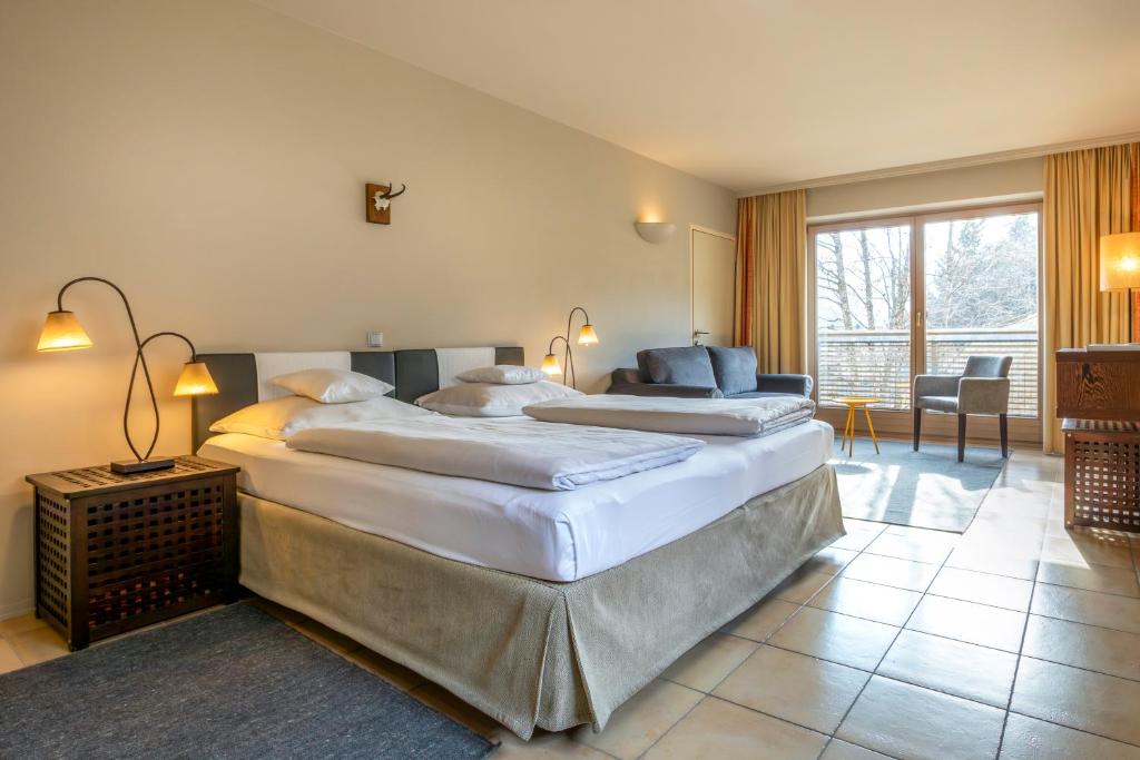 Postel nebo postele na pokoji v ubytování Hotel Edelweiss