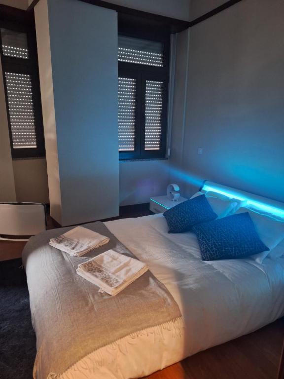 Postel nebo postele na pokoji v ubytování Easy Host Porto
