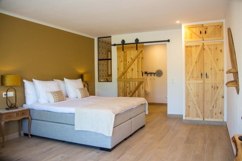Postel nebo postele na pokoji v ubytování Bed & Breakfast Los-Barquitos