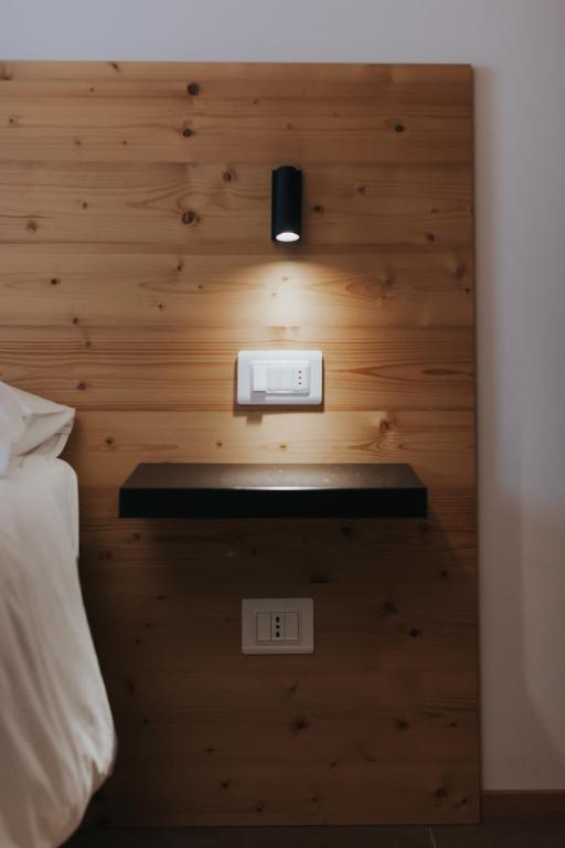 Postel nebo postele na pokoji v ubytování Falcade Lodge