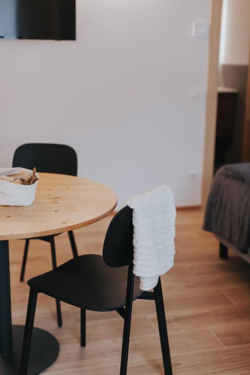 Posezení v ubytování Falcade Lodge
