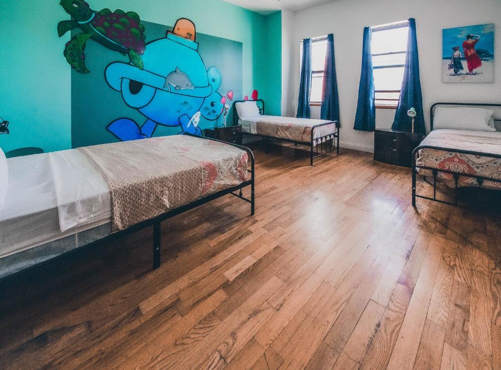 Voodi või voodid majutusasutuse NY Moore Hostel toas