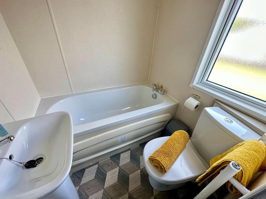 Koupelna v ubytování Spring View Hot tub Lodge