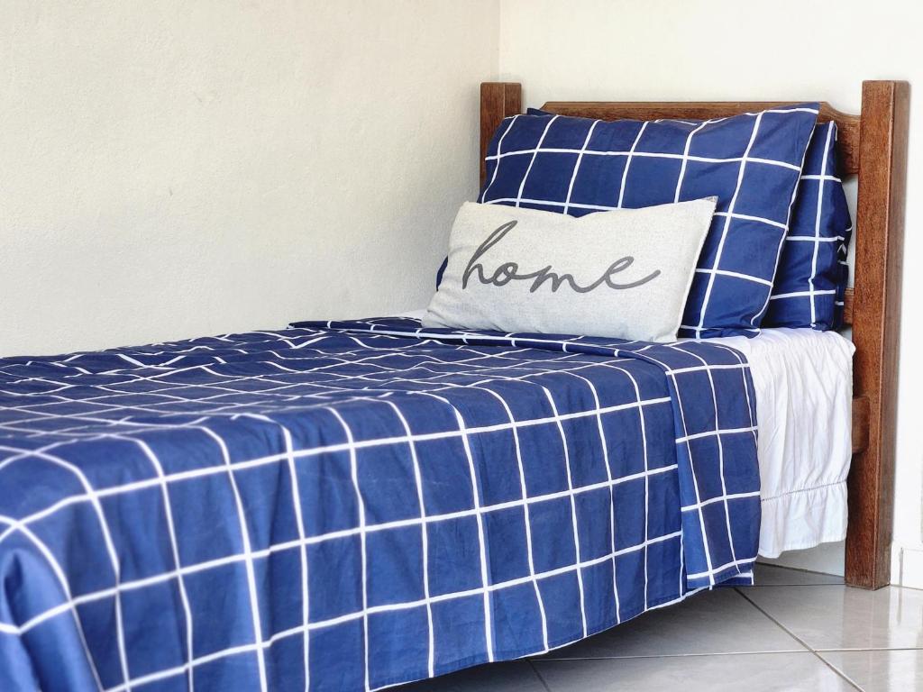 Postel nebo postele na pokoji v ubytování PousaDinháChica Hospedagem perto de Tiradentes Minas Gerais