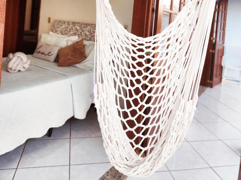 Postel nebo postele na pokoji v ubytování PousaDinháChica Hospedagem perto de Tiradentes Minas Gerais