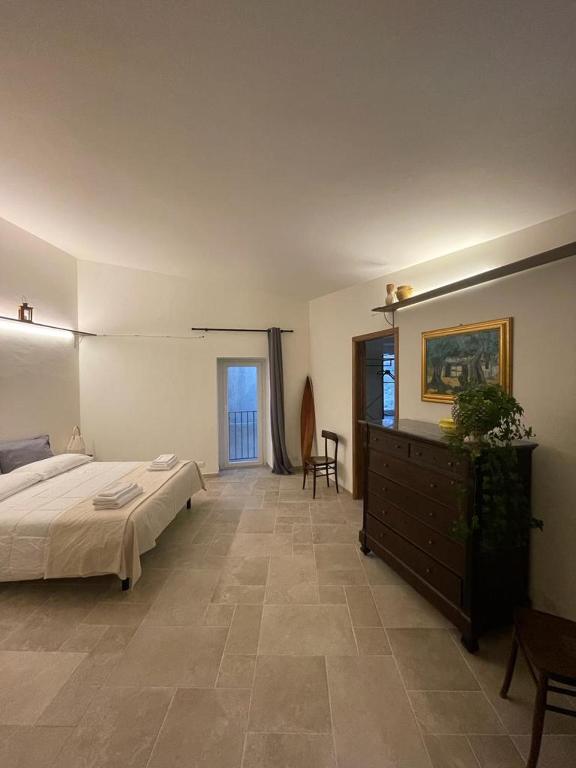 Postel nebo postele na pokoji v ubytování Baroon - Bistrot & B&B