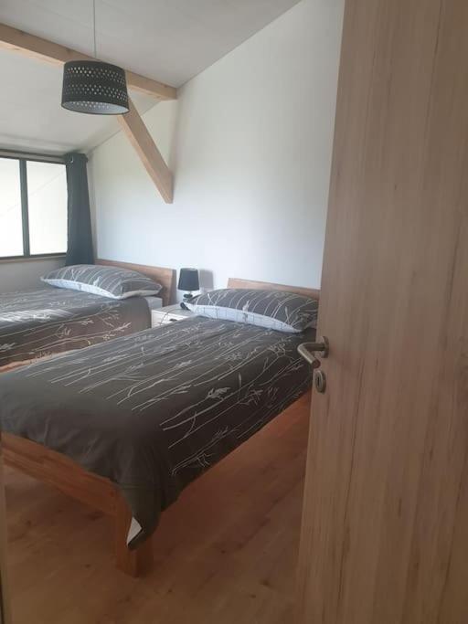 Rúm í herbergi á Coup d'œil