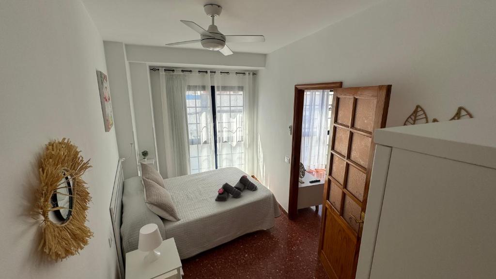 Posteľ alebo postele v izbe v ubytovaní Vivienda Vacacional Tienda Loly