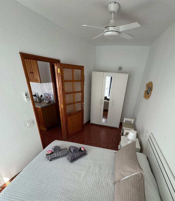 Posteľ alebo postele v izbe v ubytovaní Vivienda Vacacional Tienda Loly