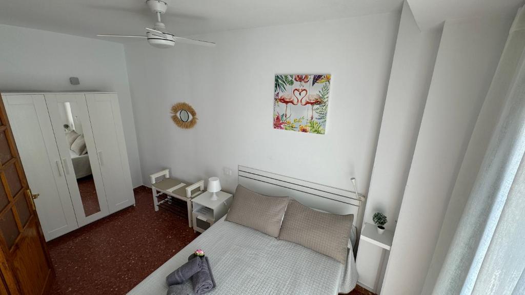 Posteľ alebo postele v izbe v ubytovaní Vivienda Vacacional Tienda Loly