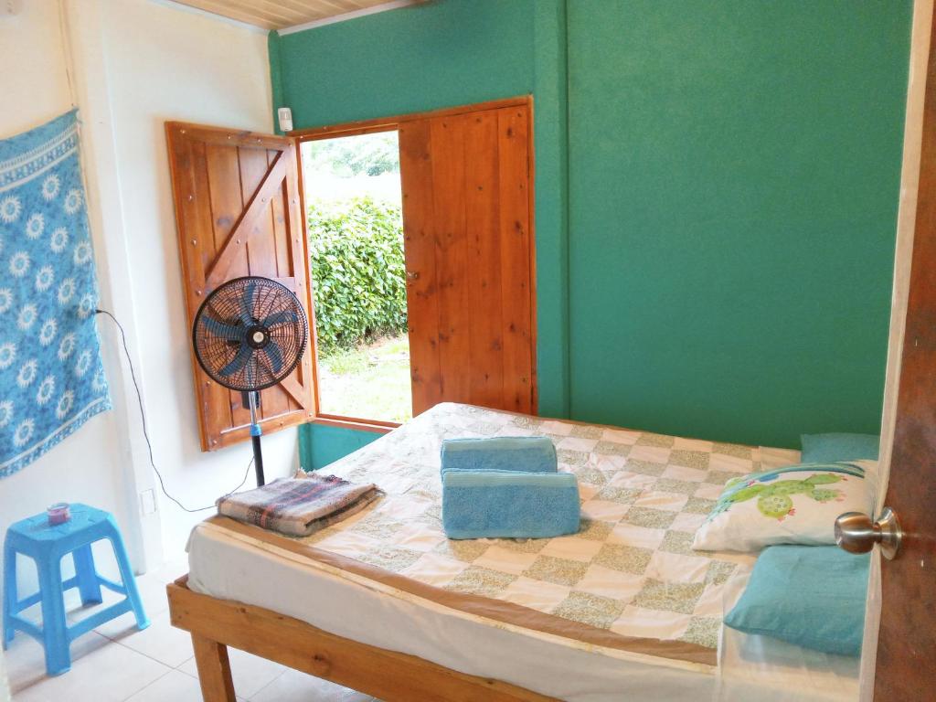 Postel nebo postele na pokoji v ubytování Hone sweet Hone (Piscine)
