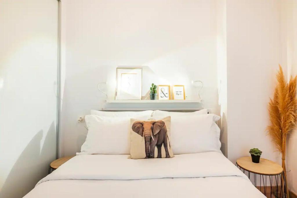 A bed or beds in a room at Santa Triada