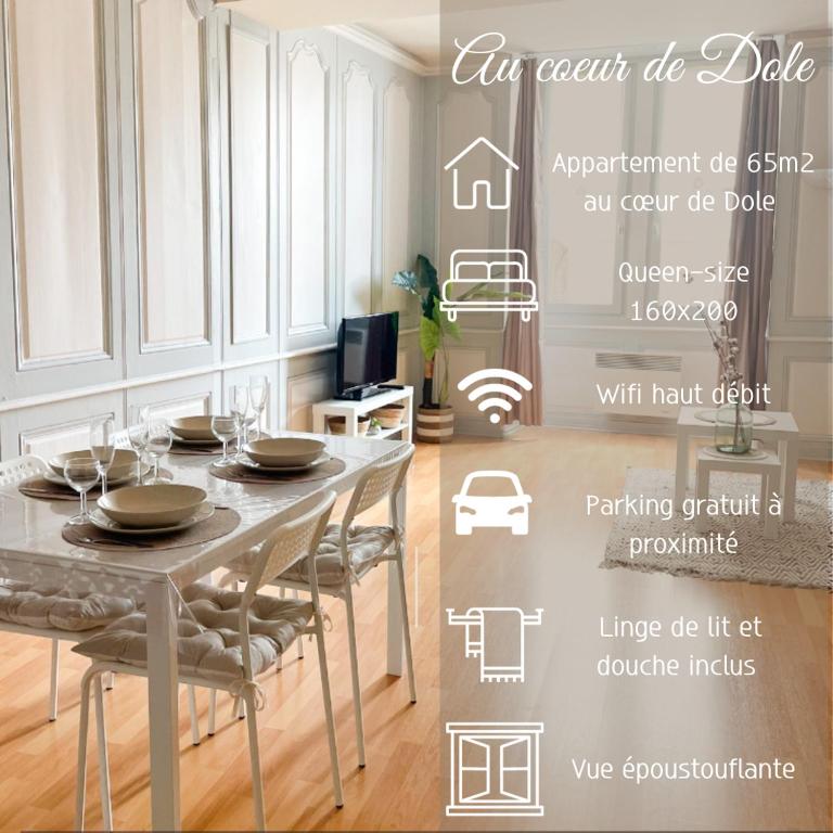 une image d'une salle à manger avec une table dans l'établissement « Au cœur de Dole », à Dole
