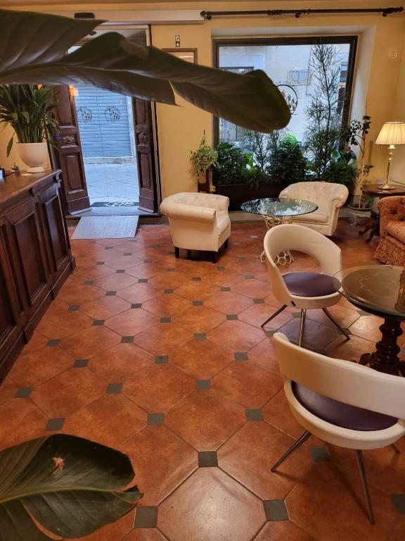 Posezení v ubytování Hotel Logge Dei Mercanti