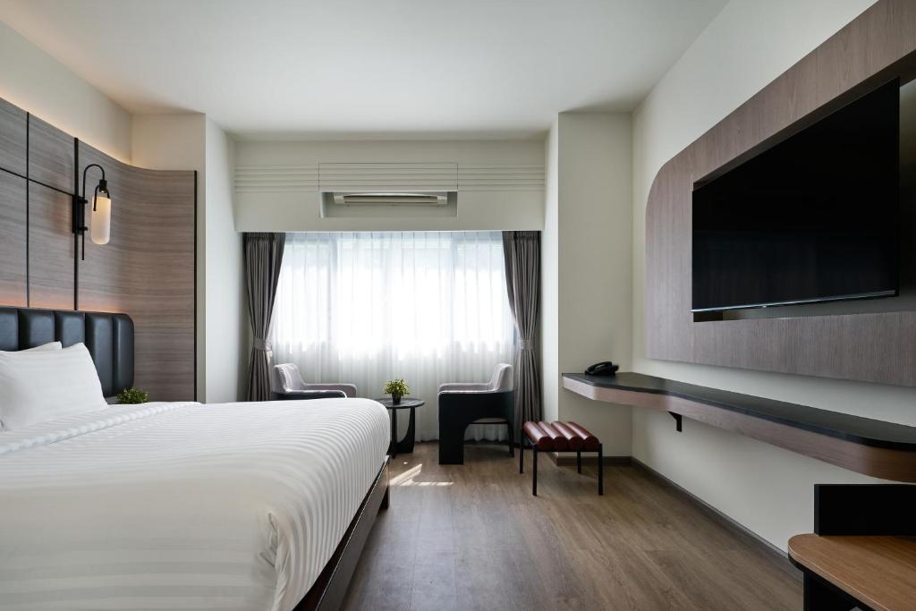 TV a/nebo společenská místnost v ubytování Panmanee Hotel-Newly Renovated