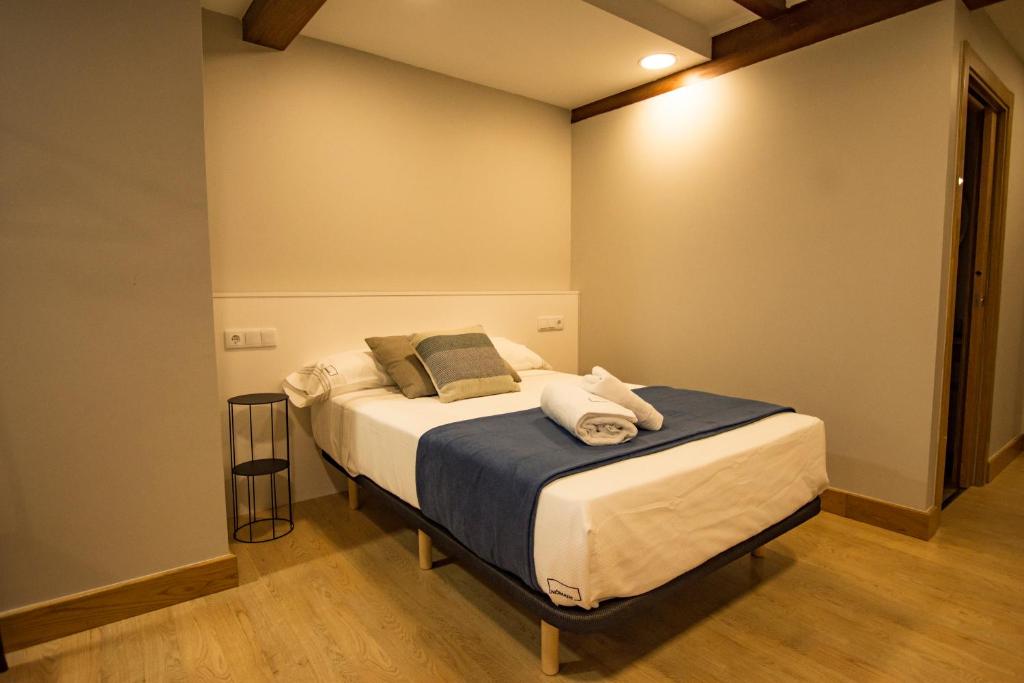 Postel nebo postele na pokoji v ubytování hostal Nomade Santiago